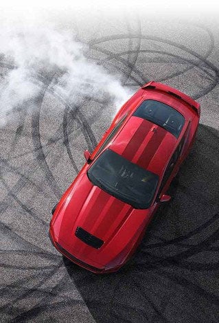 Overhead view of a 2024 Ford Mustang® model with tire tracks on pavement | Lipscomb Ford in Sayre OK